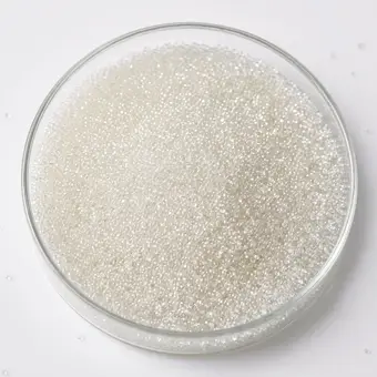 Styrene Gel White Beads resin beads in a laboratory petri dish